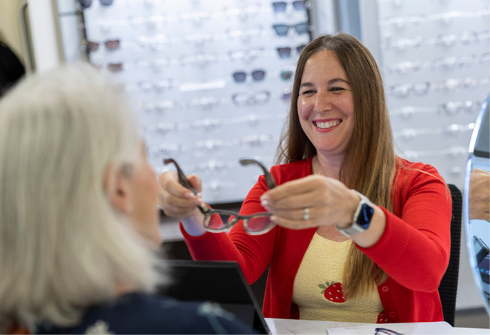 Patient being shown glasses frames