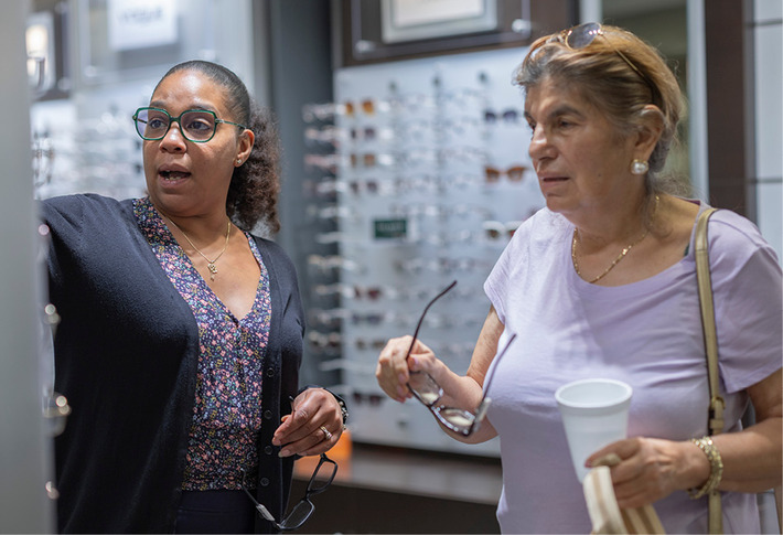Eye doctor talking to patient