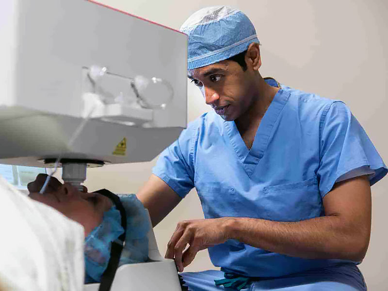 Puneet Panda, MD - Eye Surgeon with Patient at Marietta Eye Clinic.